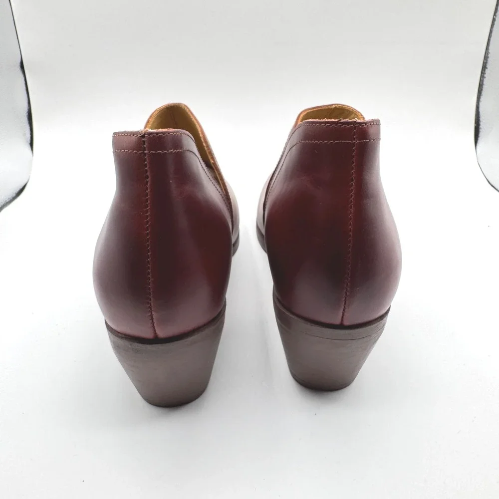 Nisolo auburn leather
